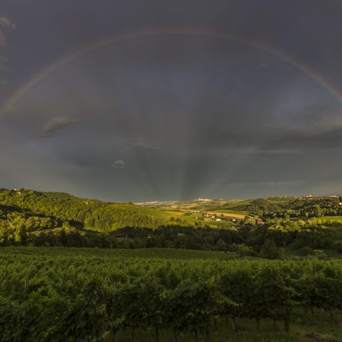 rainbow over the heart of the Monferrato UNESCO territory, seen from Grazzano Badoglio. Monferrato, Piedmont, Italy