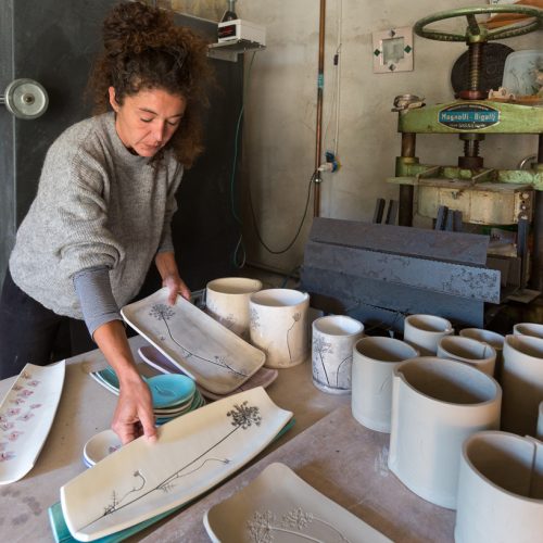 Anna unpacks her kiln after firing