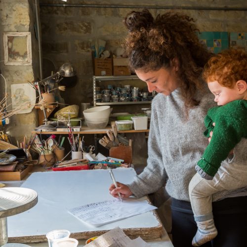 Anna works with her daughter Lia at her ceramics laboratory