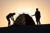 Erecting a tent in the Rub al Kali desert in Oman