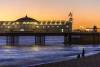 Brighton Pier at sunset. Brighton, Sussex, UK.