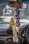 buddha and cloves decorate a Kathmandu taxi, Nepal